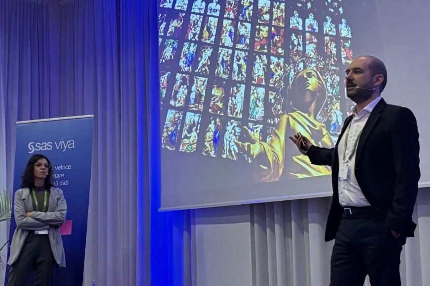Nicola Scarfone speaking at an AI event